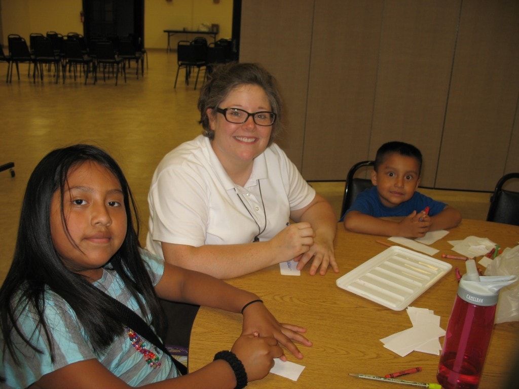 Jaime, one of our postulants, helps the kids with their Gifts of the Holy Spirit Links.