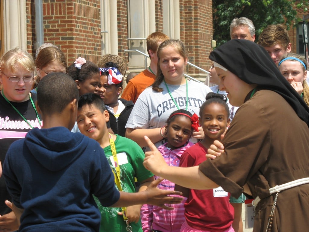 Sr. Kate leads more name games.