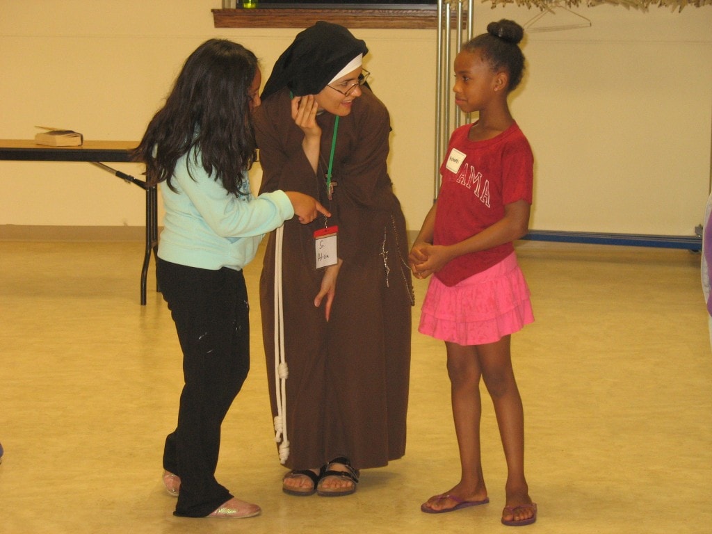 Sr. Alicia explains why she wears the veil to the young ladies.